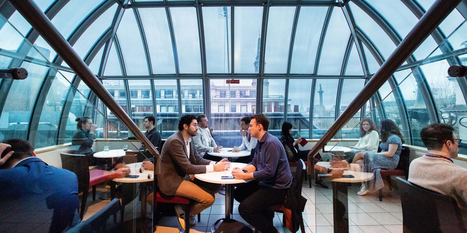 People sat in the Balcony bar at the London Coliseum - Front of House image