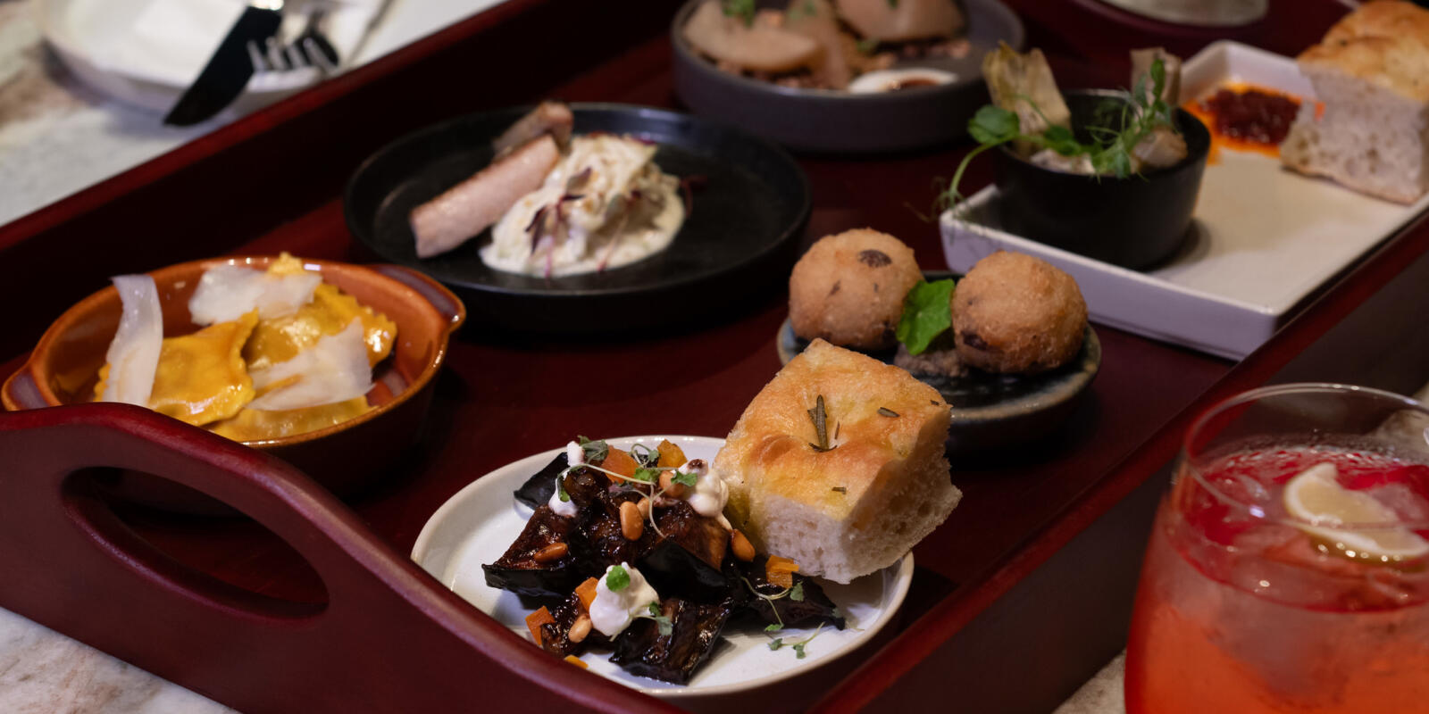 View of a selection of dishes in the Small Plates Dining Package at the London Coliseum
