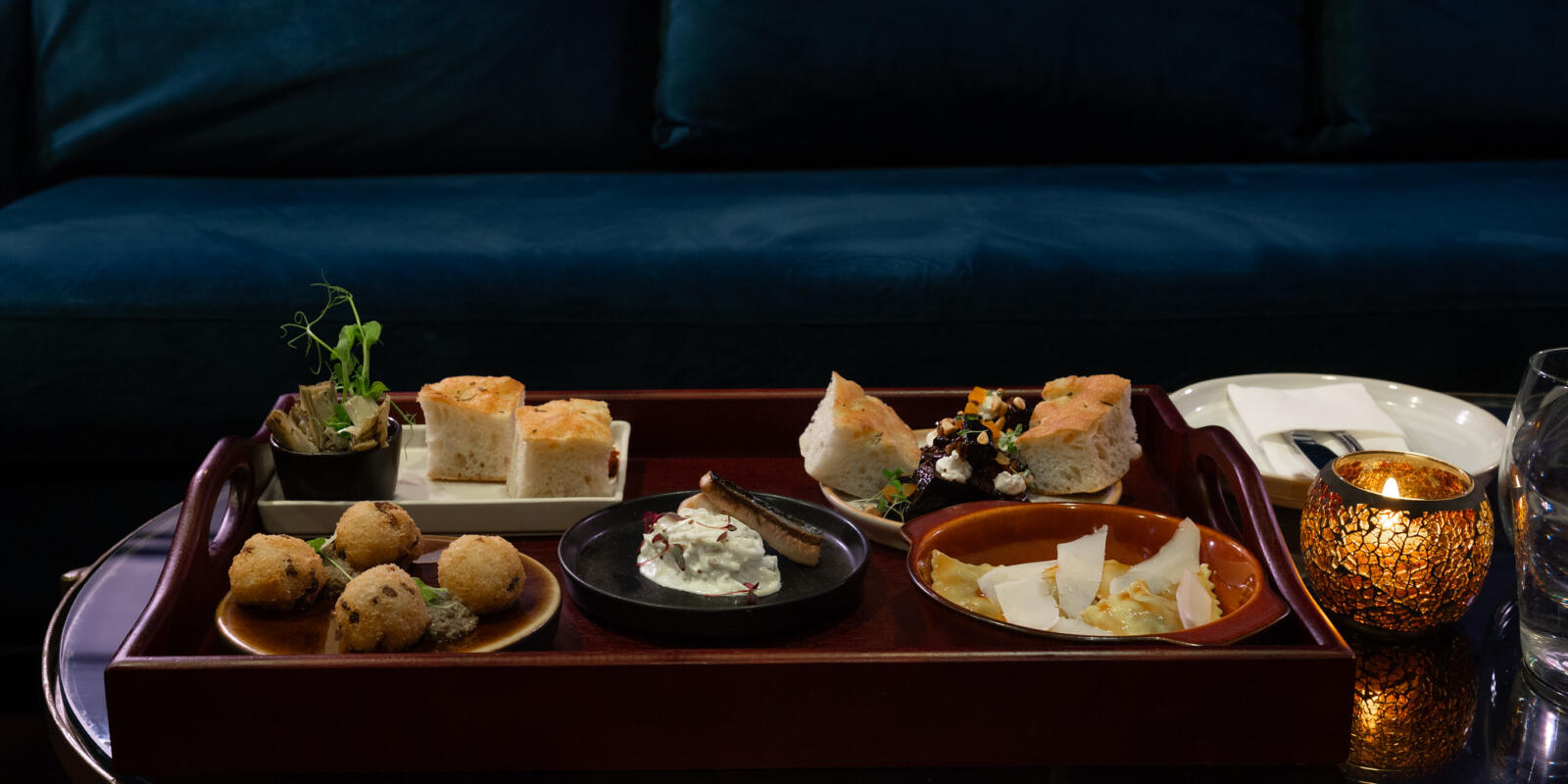 View of a selection of dishes in the Small Plates Dining Package at the London Coliseum