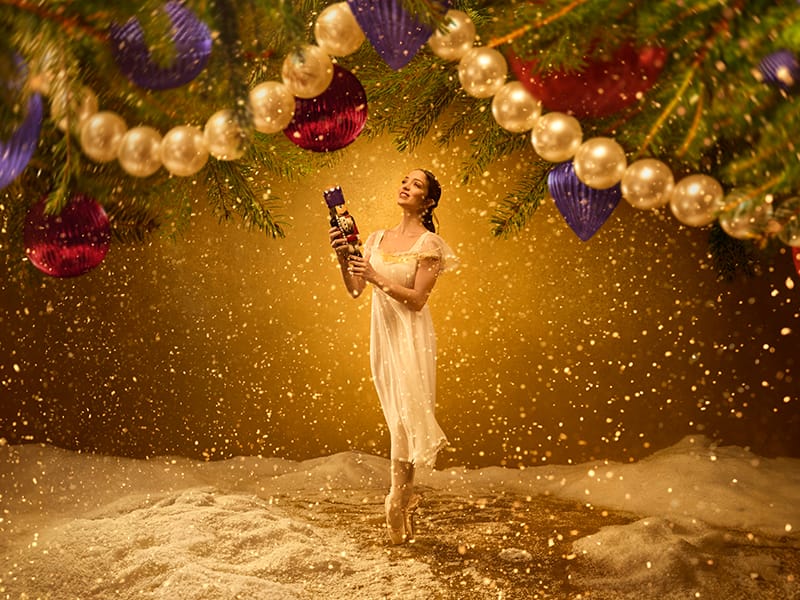 ENB_Nutcracker_800x600 English National Ballet (ENB)'s image of a ballet dancer on pointe holding a toy Nutcracker for The Nutcracker 2024/25